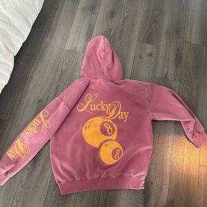 Urban Outfitters Oversized Pink Hoodie with Lucky Day Graphic